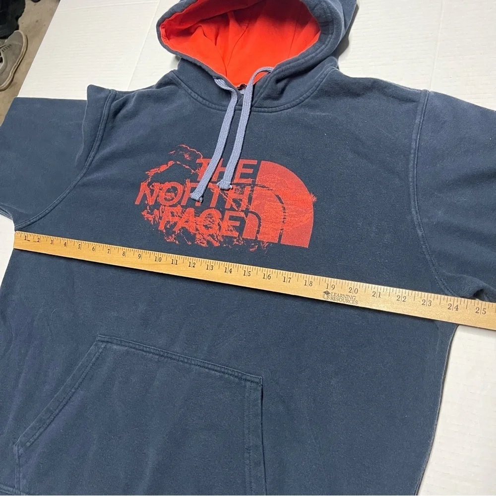 The North Face Men's Navy Hoodie with Orange Logo